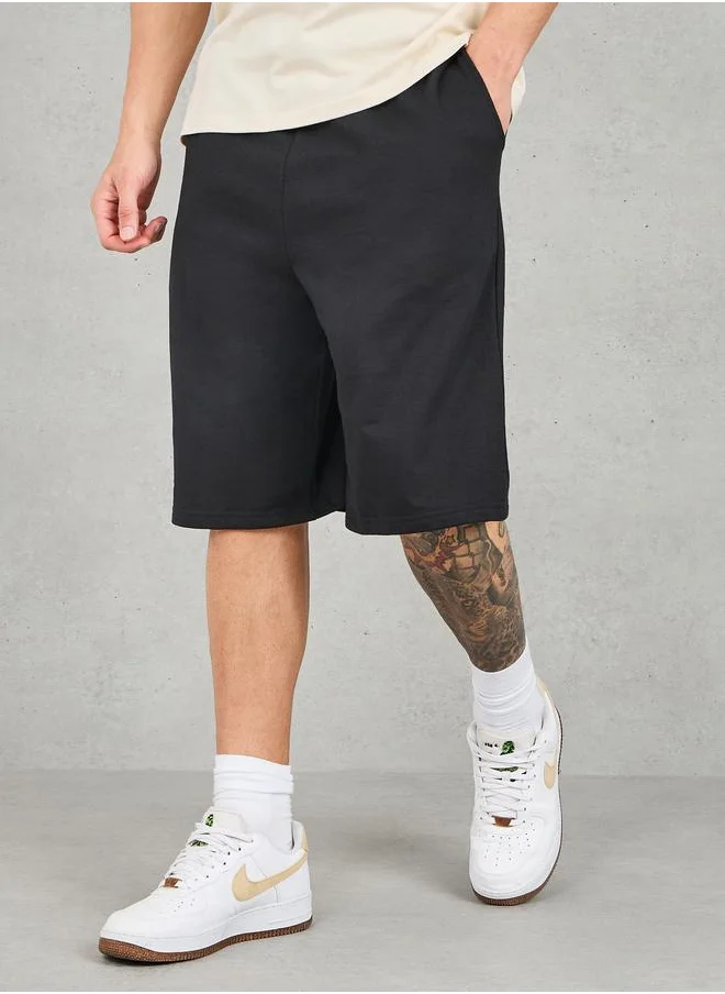 ستايلي Styli Oversized Solid Shorts with Drawstring