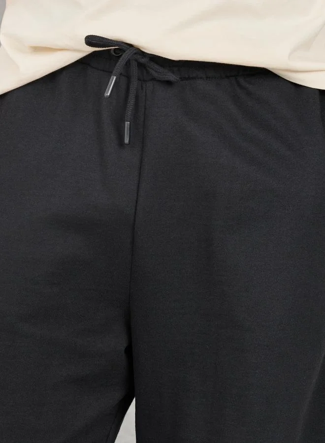 Styli Styli Oversized Solid Shorts with Drawstring