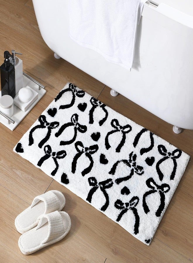 Tinideya Black Bow Bathroom Rug, 20 x 32 Inch Coquette Cute Bath Mat for Bathroom Non Slip Absorbent Carpet Preppy Bow Bath Rug Washable Mat for Front Door, Bedroom, Living Home Room Decor - Image 1