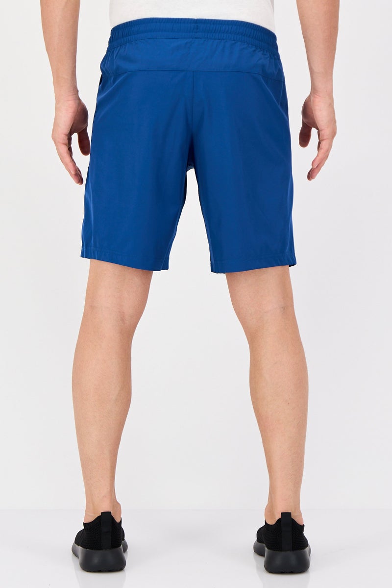 Reebok شورتات تدريب رياضية للرجال بشعار العلامة التجارية، أزرق رياضي - Image 2