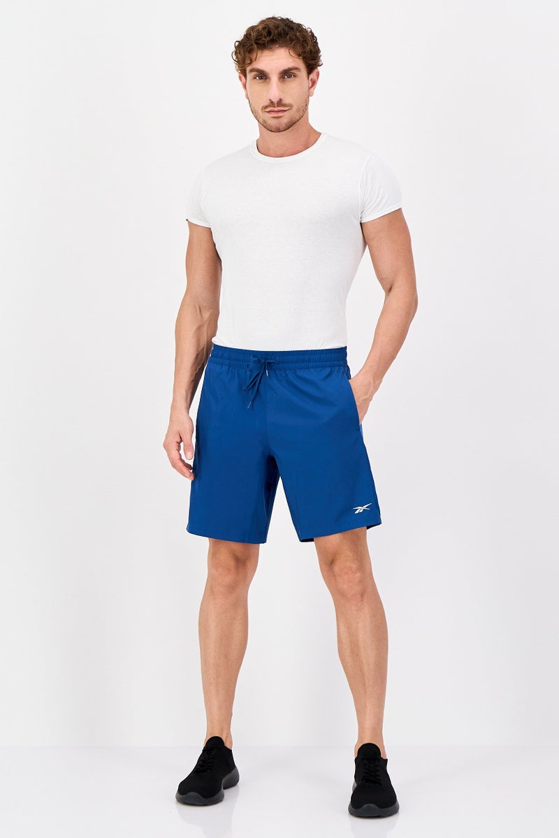 Reebok شورتات تدريب رياضية للرجال بشعار العلامة التجارية، أزرق رياضي - Image 4