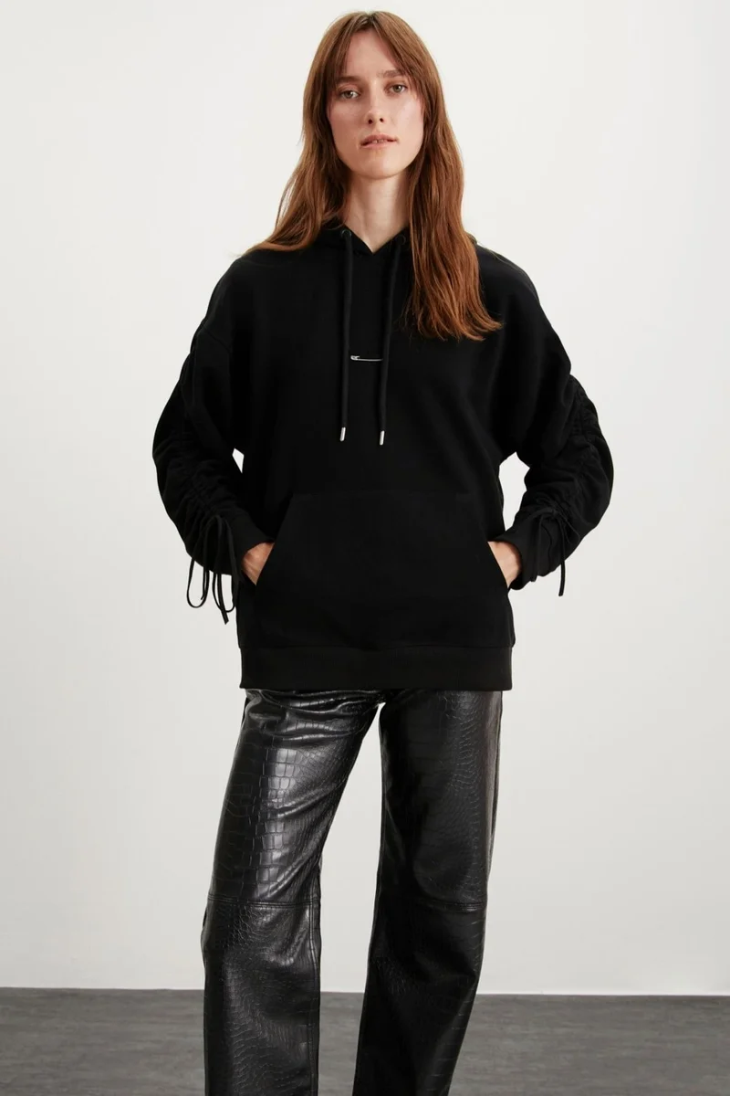 GRIMELANGE Meara Women's Hooded Sleeve Tie Detail Kangaroo Pocket Needle Detail Black Sweatshirt