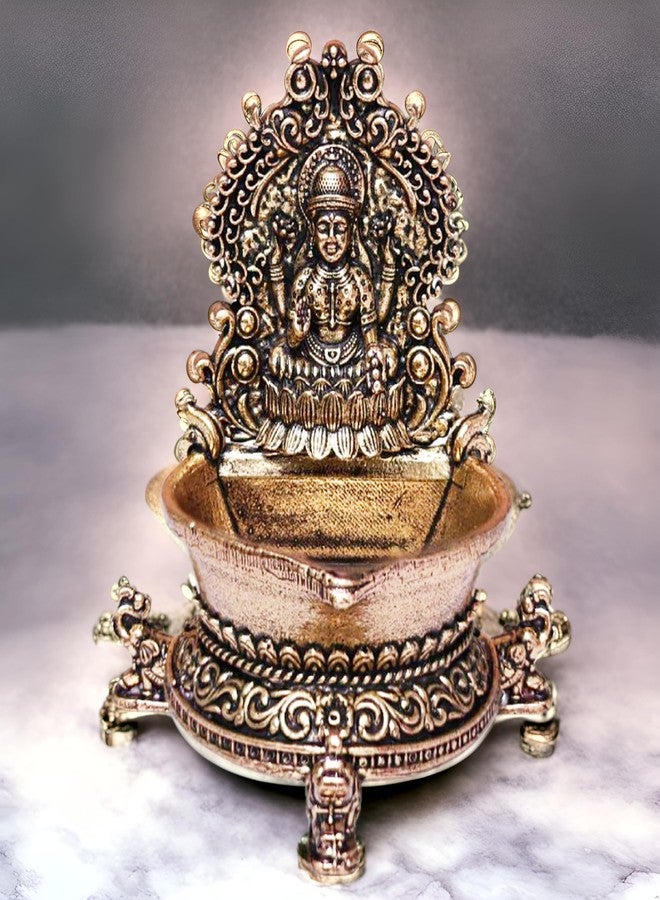 BEXCO مصباح زيت لاكشمي ديا من النحاس، مطلي بالذهب العتيق، مناسب لطقوس العبادة الهندوسية التقليدية وديكورات عيد ديوالي، أبعاده 2.8 × 2 × 3 بوصات، ووزنه 90 غرامًا. - Image 4