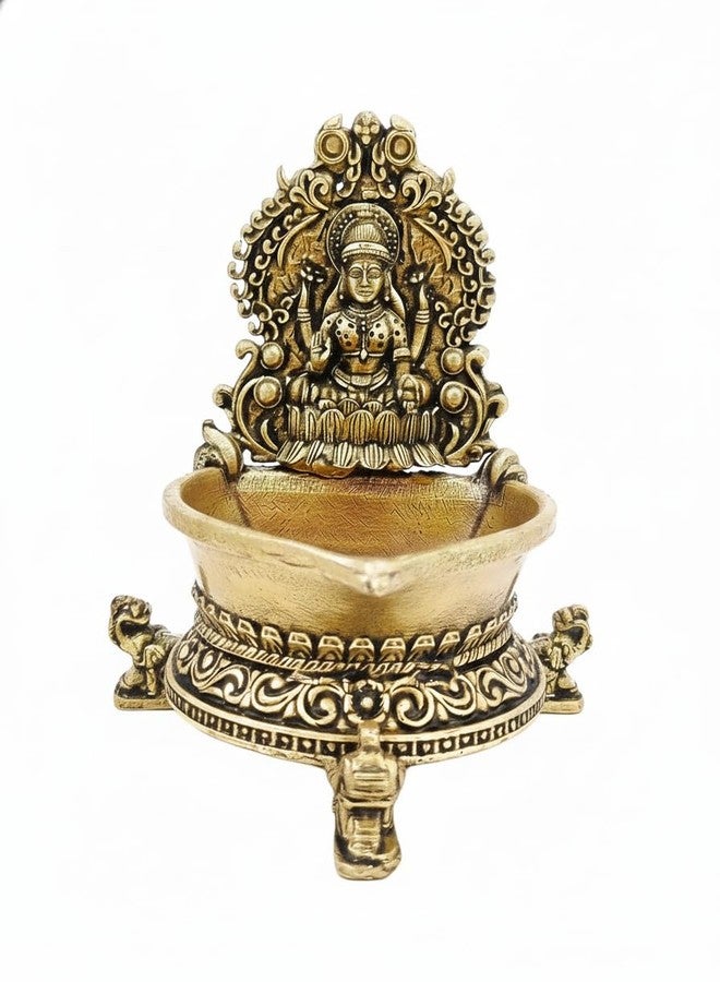 BEXCO مصباح زيت لاكشمي ديا من النحاس، مطلي بالذهب العتيق، مناسب لطقوس العبادة الهندوسية التقليدية وديكورات عيد ديوالي، أبعاده 2.8 × 2 × 3 بوصات، ووزنه 90 غرامًا. - Image 1