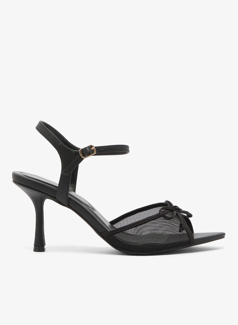 ترافل من نمشي صنادل بكعب متوسط بتفاصيل فيونكة من الشبك