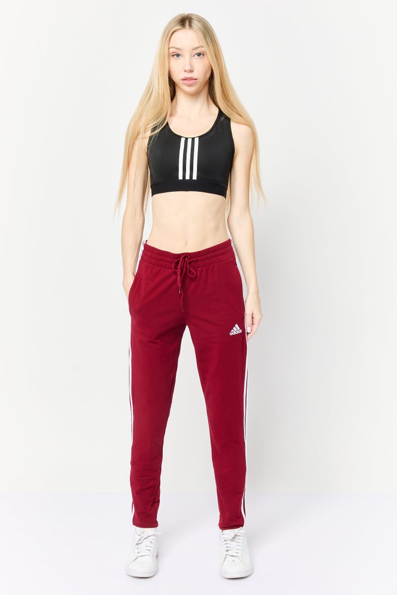 Adidas Women Sportswear Fit Outdoor Sweatpants, Maroon - Image 1