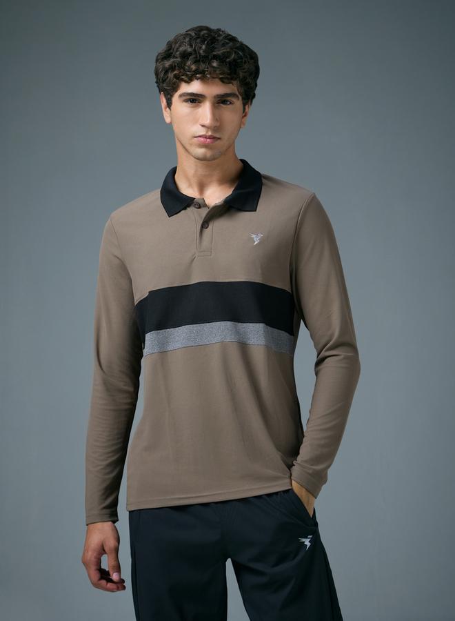 تكنوسبورت بولو بقصة ضيقة وتفاصيل متباينة - Image 1