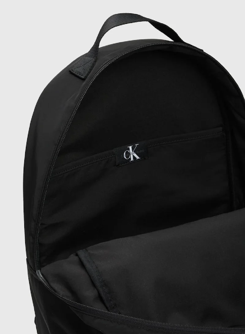 Calvin Klein Jeans Men's Round Backpack -  soft recycled polyester exterior, Black