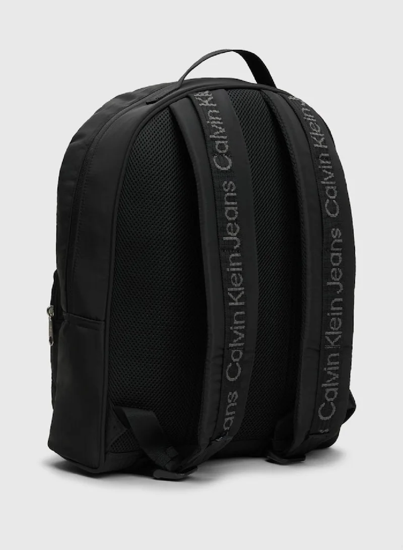 Calvin Klein Jeans Men's Round Backpack -  soft recycled polyester exterior, Black