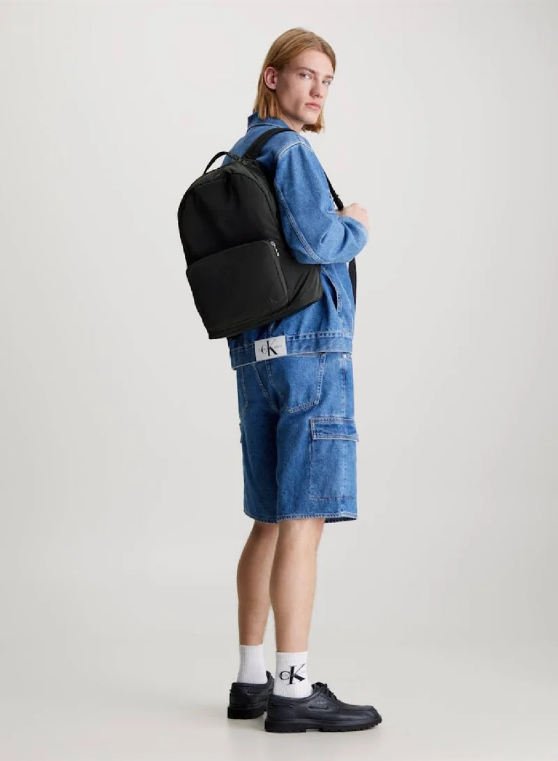 Calvin Klein Jeans Men's Round Backpack -  soft recycled polyester exterior, Black