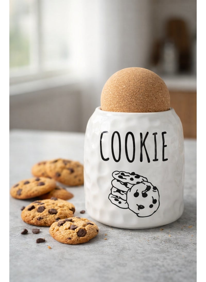 A practical cookie jar with a tight-fitting lid that keeps cookies fresh and crisp for a long time, with a stylish kitchen design.