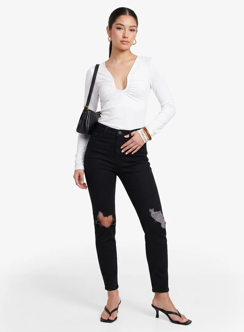 Distressed High Rise Skinny Jeans