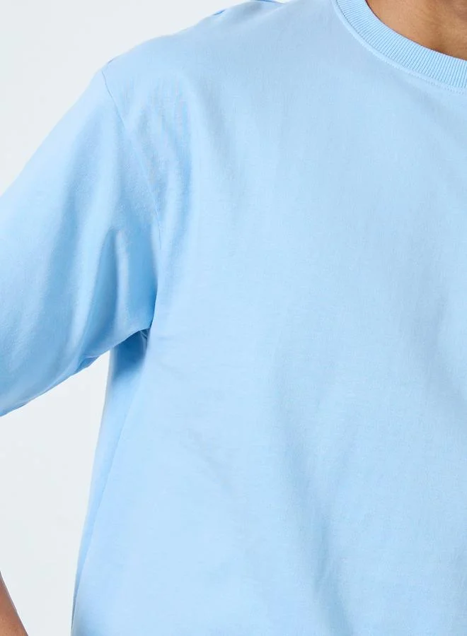 Styli Styli Men Graphic Print Interlock Oversized T-Shirt