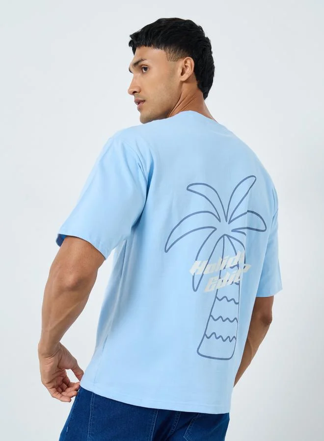 Styli Styli Men Graphic Print Interlock Oversized T-Shirt