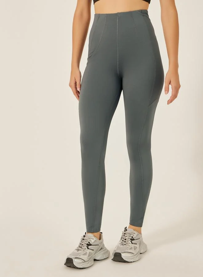 Styli Active Stitch Detail Back Waist Zipper Pocket Leggings