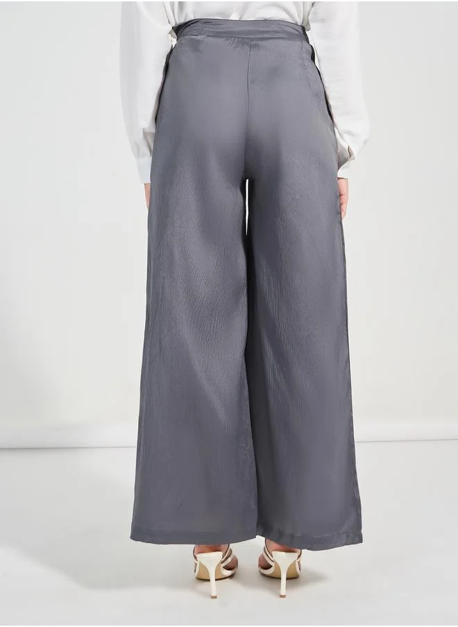 ستايلي Textured Wide Leg Pants with Concealed Zip