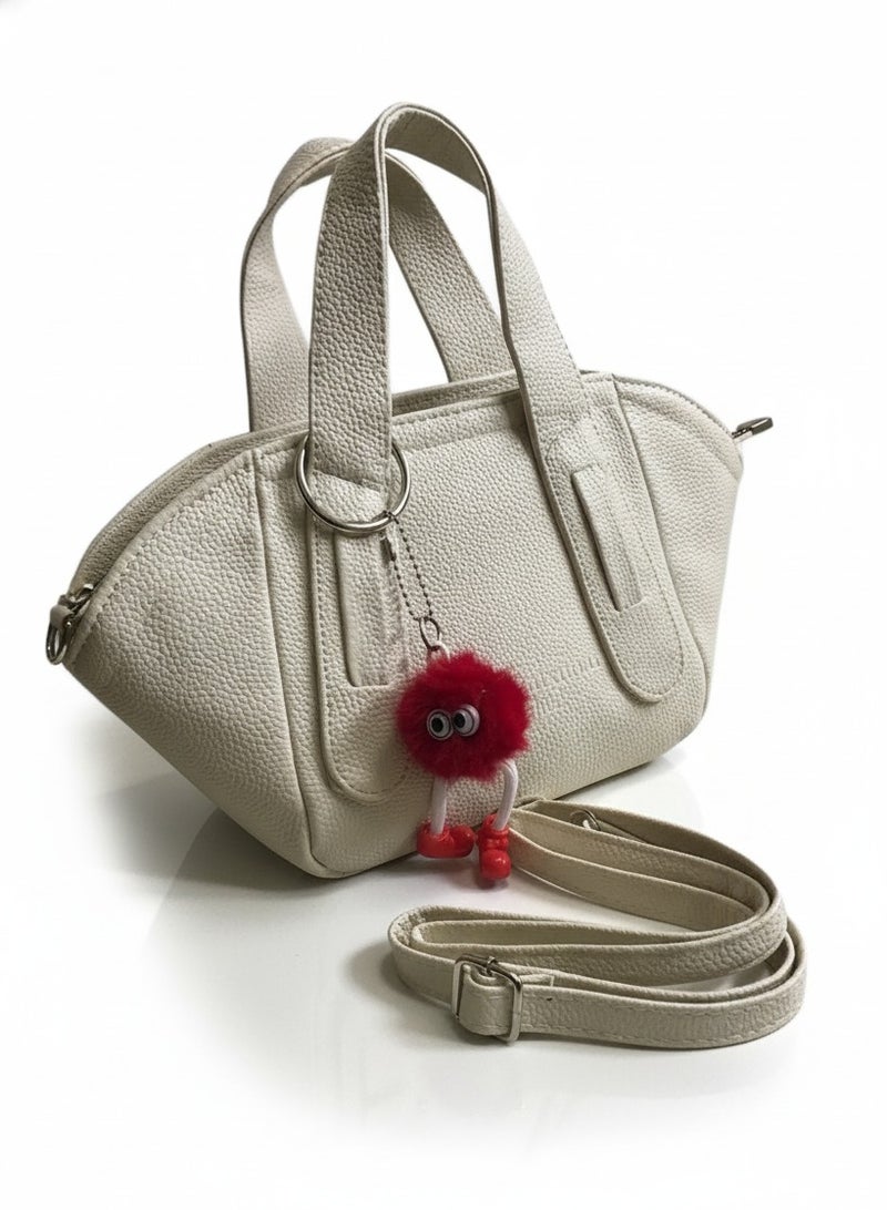 شنطة جلد حريمي هاند + كروس مع ميدالية – تصميم عصري عملي وأنيق - Image 1