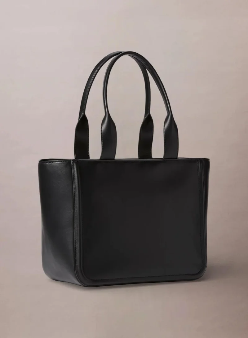 Calvin Klein BLACK/WHITE Embossed Monogram Logo Tote Bag for Women | Best Price UAE