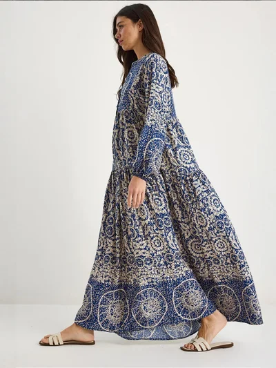 Bianco Lucci Patterned Maxi Dress with V-neck and Button Closure