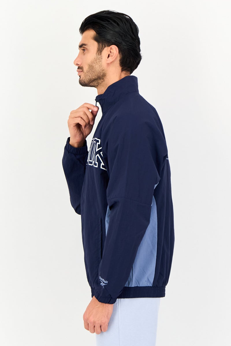 Reebok جاكيت تدريب رياضي للرجال بأكمام طويلة، لون كحلي - Image 4