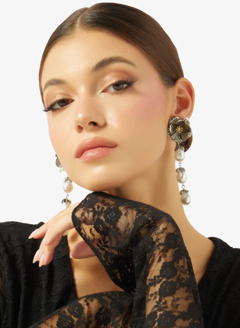 Ella White Drop Down Pearl Earrings With Silver Floral Accent for Women | Best Price UAE