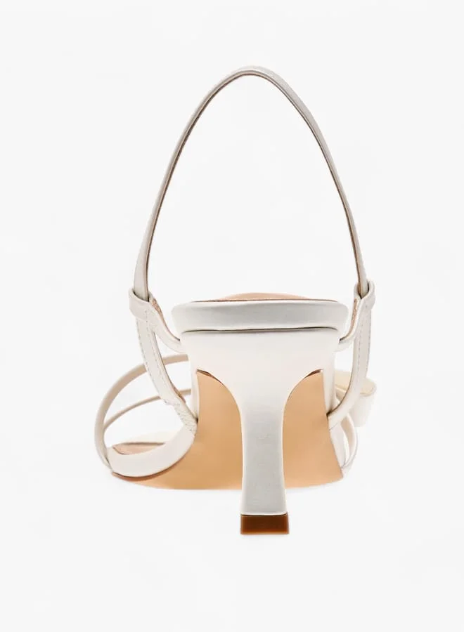 فلورا بيلا من شو إكسبرس Women Bow Applique Slingback Sandals with Flared Heel