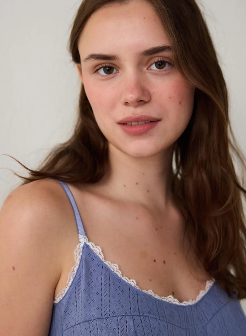 بنتي بلوزة بدون أكمام دانتيل قطن أزرق نيلي بنقوش زهور مفتوحة