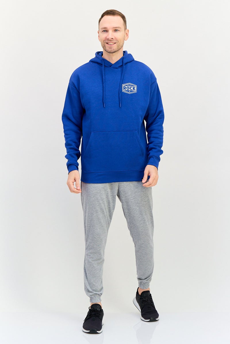 UNDER ARMOUR هودي خارجي بأكمام طويلة فضفاضة للرجال من أندر أرمور × مشروع روك، أزرق - Image 4