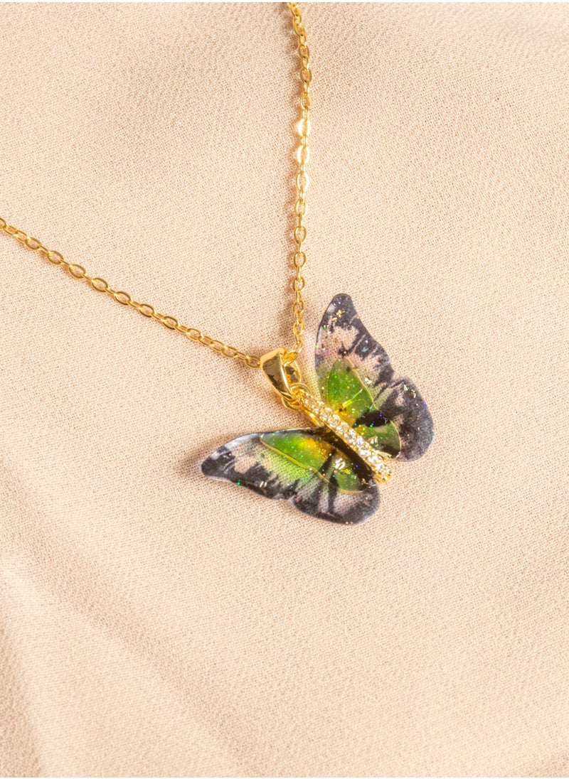 The Black Pearl Accessories Stainless Steel Necklace Gold with a Black Green Butterfly Pendant  - Image 1
