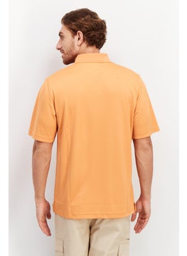 Greg Norman Men Performance Fit Short Sleeve Polo Shirt, Orange  - Image 2