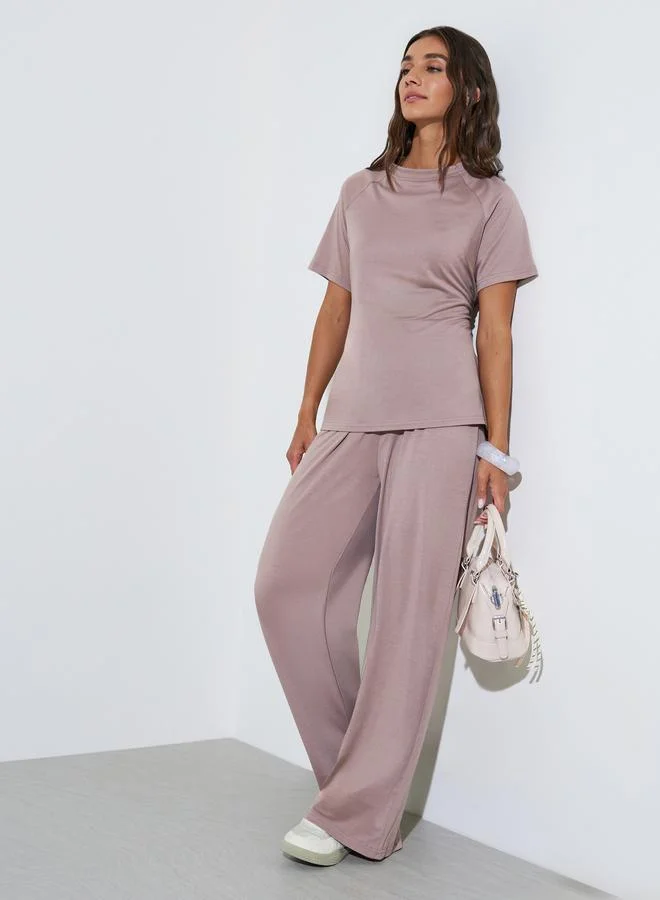 ستايلي Solid Back Tie Strap Top and Wide Leg Pants Co-Ords