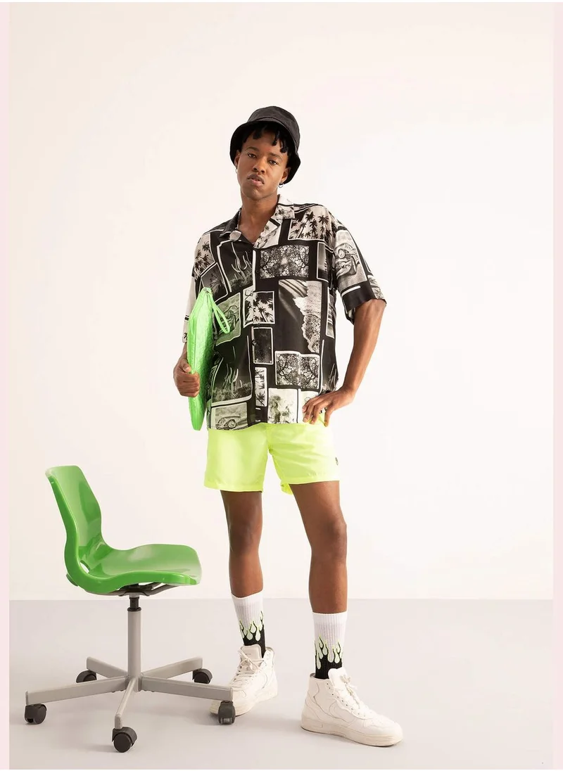 ديفاكتو Man Oversize Fit Woven Short Sleeve Shirt