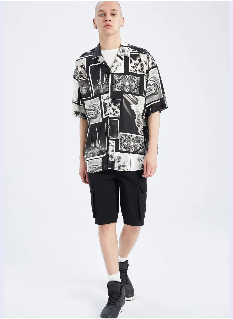 ديفاكتو Man Oversize Fit Woven Short Sleeve Shirt