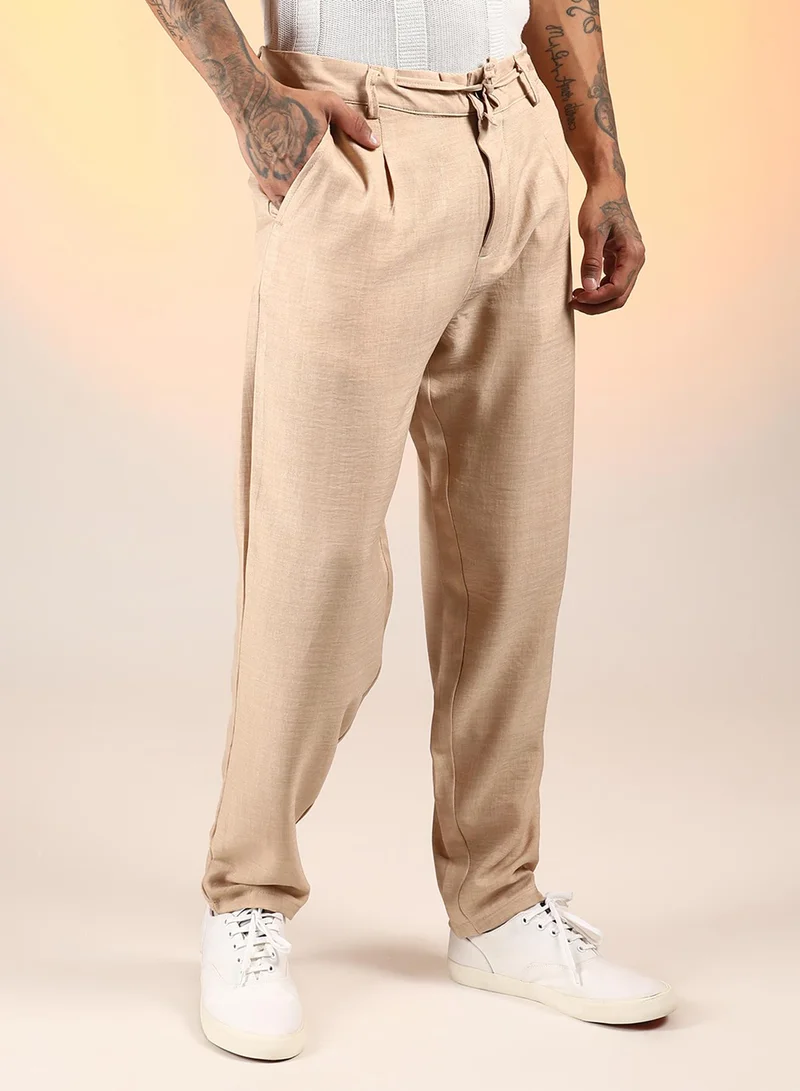Campus Sutra Men's Saltbox Beige Solid Pleated Trousers