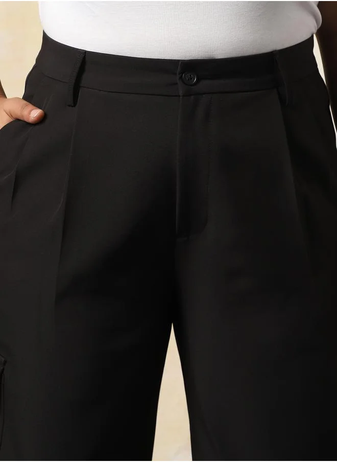 هاي ستار Women Trousers in Black featuring Wide Leg fit with a solid pattern, regular length, secured with button closure, crafted from 95% polyester 5% spandex – your go-to choice for effortless elegance.