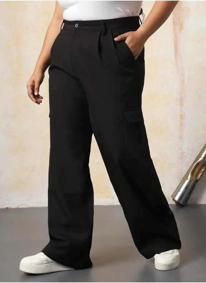 هاي ستار Women Trousers in Black featuring Wide Leg fit with a solid pattern, regular length, secured with button closure, crafted from 95% polyester 5% spandex – your go-to choice for effortless elegance.