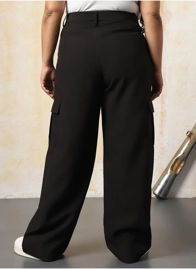 هاي ستار Women Trousers in Black featuring Wide Leg fit with a solid pattern, regular length, secured with button closure, crafted from 95% polyester 5% spandex – your go-to choice for effortless elegance.