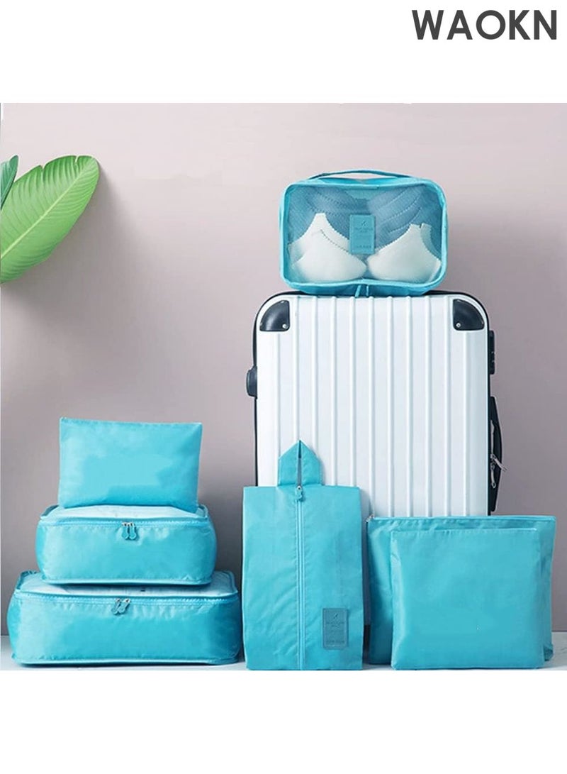 دبليو أيه أو كي أن مجموعة مكعبات التعبئة من 7 قطع - منظمات سفر خفيفة الوزن للأمتعة مع حقيبة غسيل وحقيبة أحذية - حقائب تخزين شبكية قابلة للطي لحقيبة السفر والحمل - معتمدة من إدارة أمن النقل ومقاومة للتجاعيد (أزرق) - مثالية للعطلات ورحلات العمل - Image 1