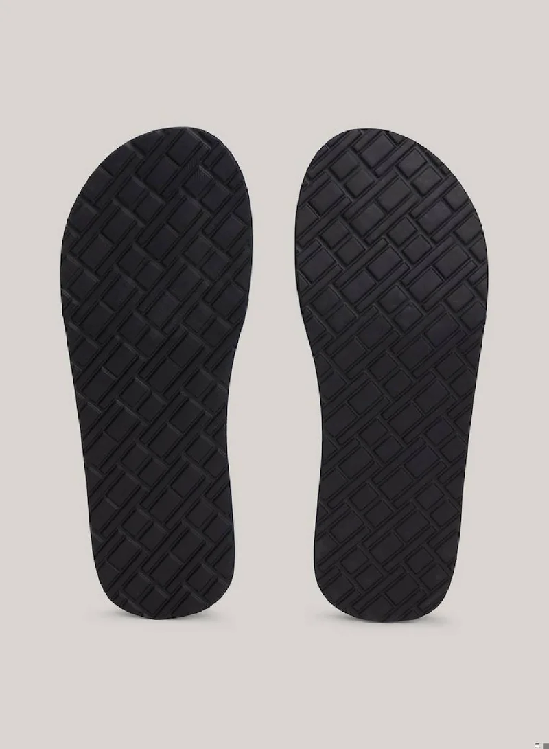 TOMMY HILFIGER Men's Hilfiger Monotype Webbing Strap Flip-Flops -  Polyester webbing upper, Blue