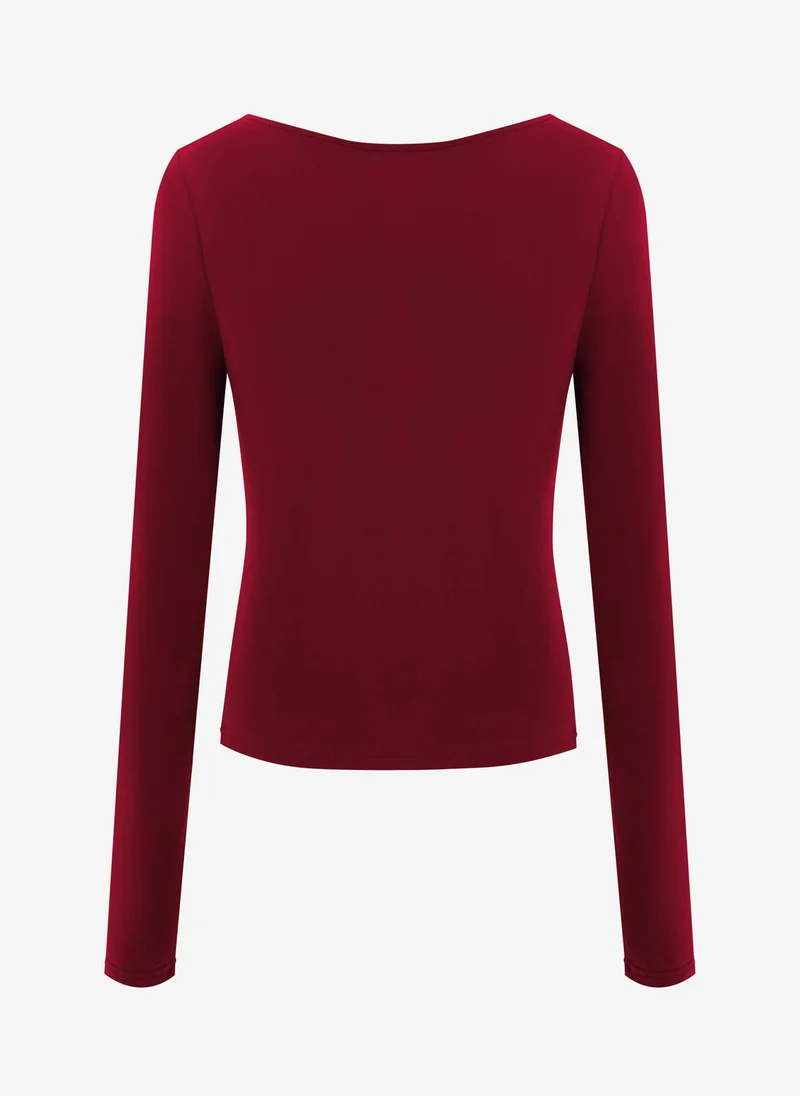 Lichi Jersey longsleeve with gathers at the shoulder and waist