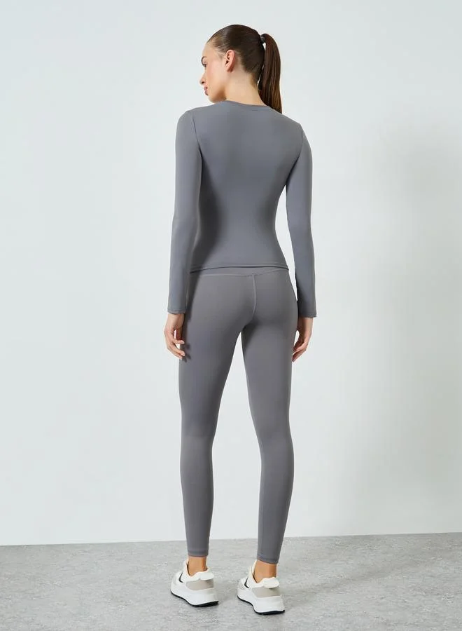 Styli Active  Stitch Detail Long Sleeve Top and Leggings Set for Women | Best Price UAE