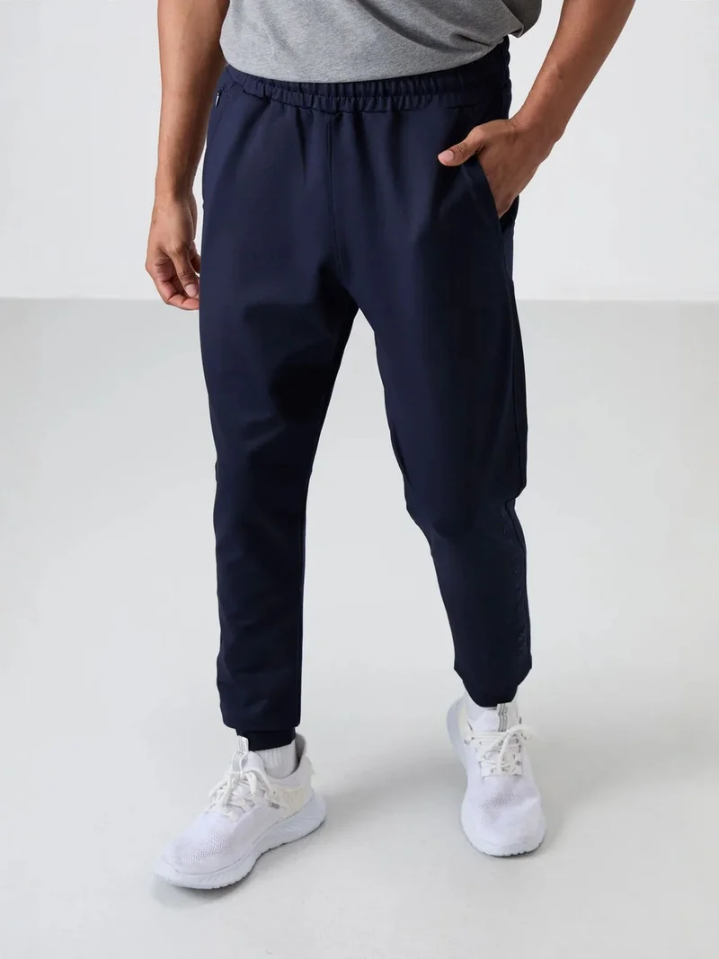 تومي لايف TOMMY Men's Regular Fit Cotton Blend Sweatpants