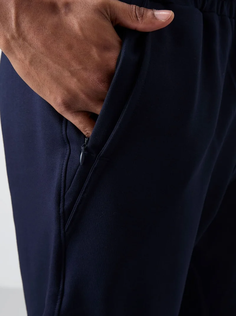 تومي لايف TOMMY Men's Regular Fit Cotton Blend Sweatpants