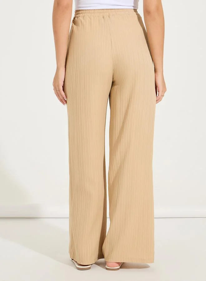 Styli Textured Wide Leg Pants with Drawstrings