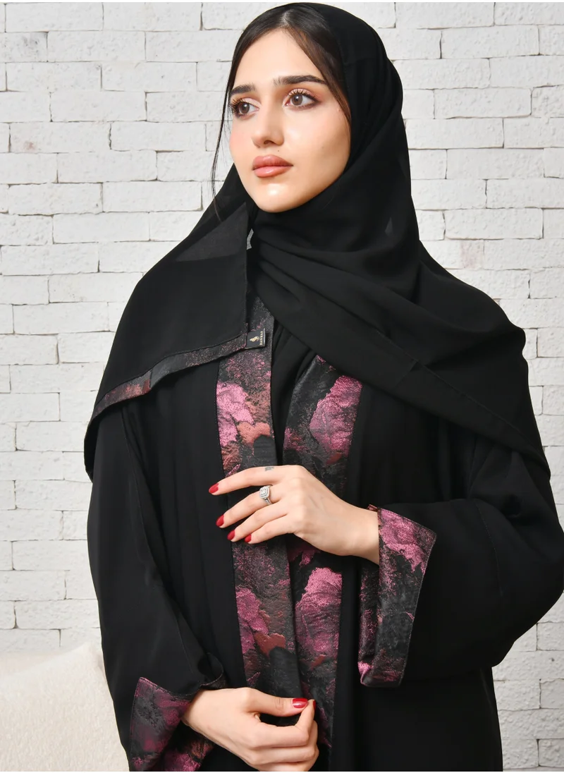 HAWRAA ABAYA A black quarter-cloth wrap abaya with summer jacquard fabric overlapping in bright colors