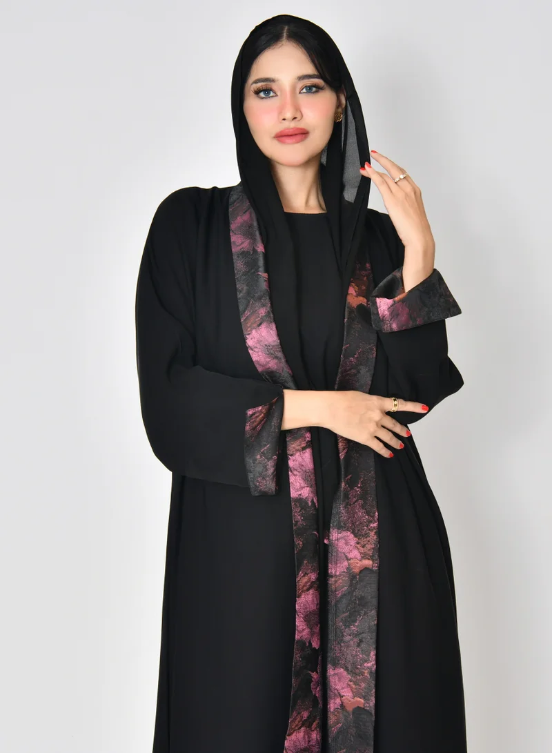 HAWRAA ABAYA A black quarter-cloth wrap abaya with summer jacquard fabric overlapping in bright colors