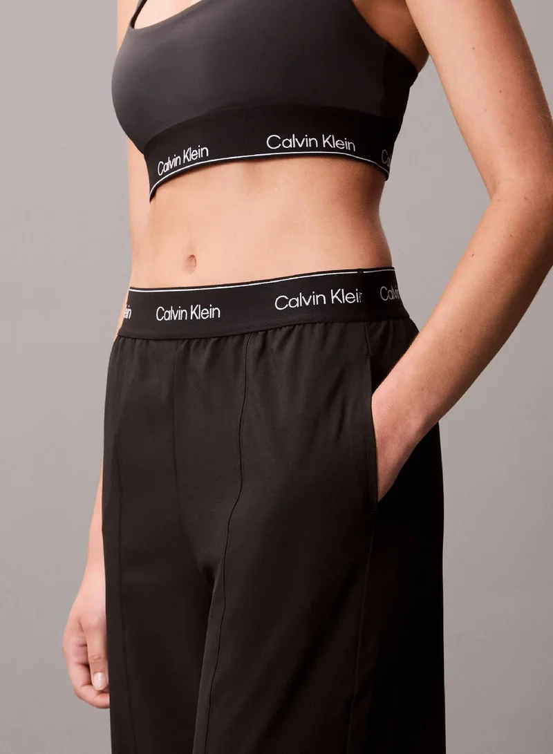 Calvin Klein Black Performance Wide Leg Tracksuit Bottoms for Women | Best Price UAE