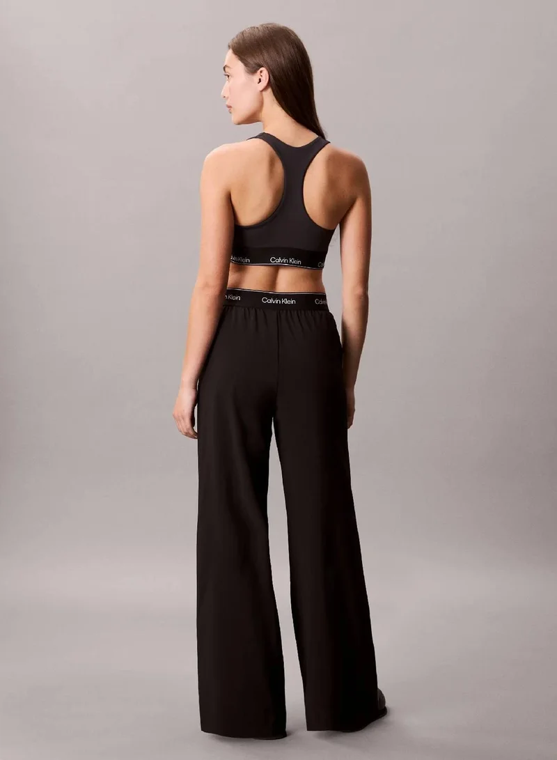 Calvin Klein Black Performance Wide Leg Tracksuit Bottoms for Women | Best Price UAE