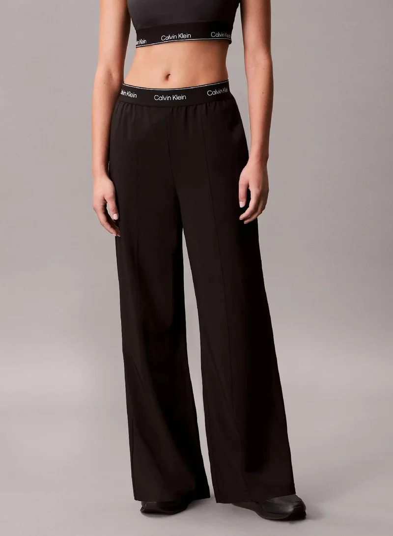 Calvin Klein Black Performance Wide Leg Tracksuit Bottoms for Women | Best Price UAE
