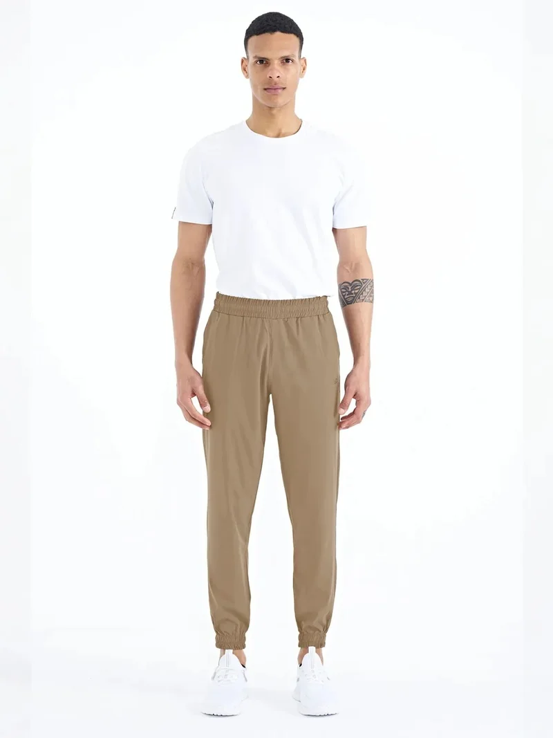 تومي لايف TOMMY Men's Woven Jogger Sweatpants